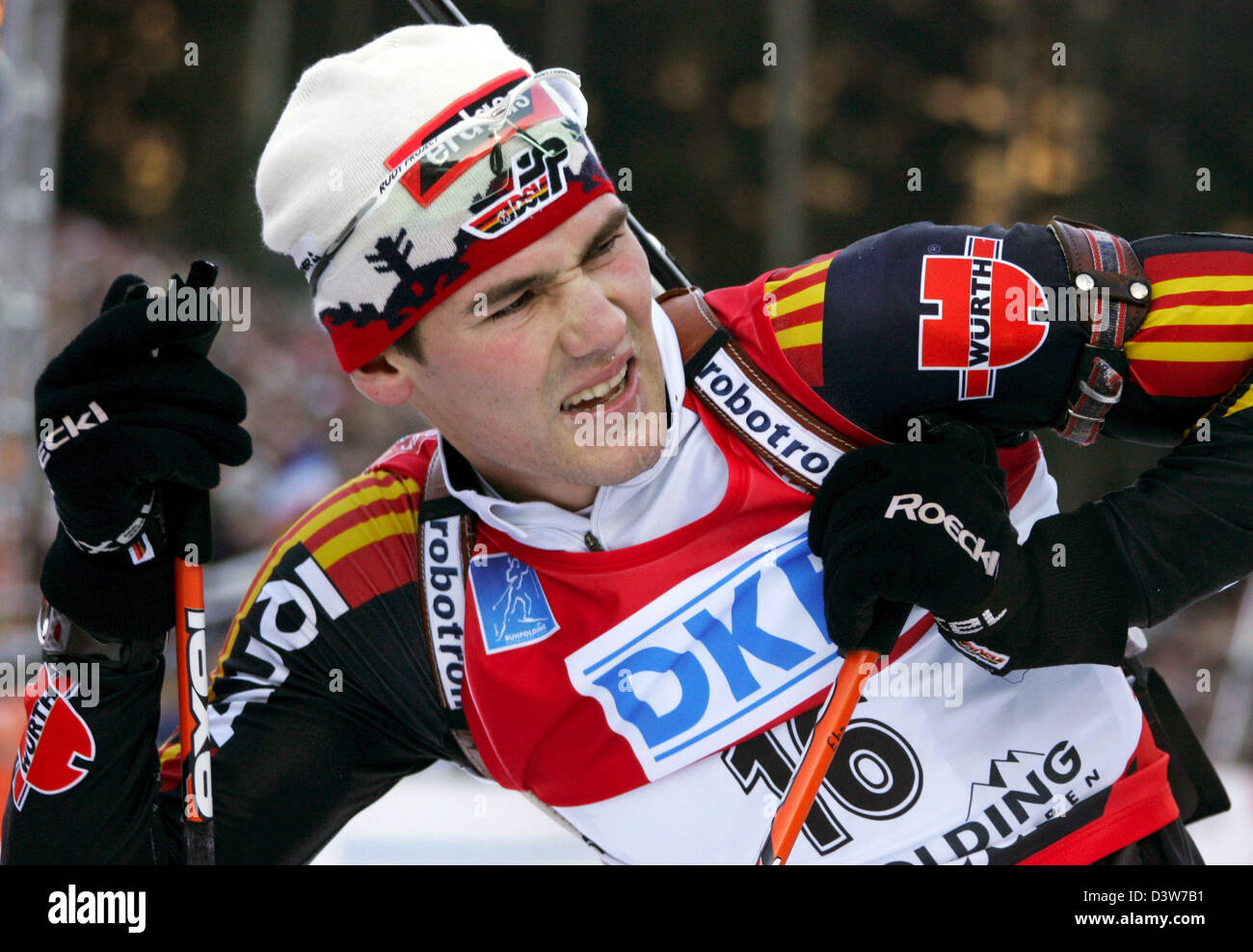 German biathlete Michael Roesch arrives at the finish line during the ...