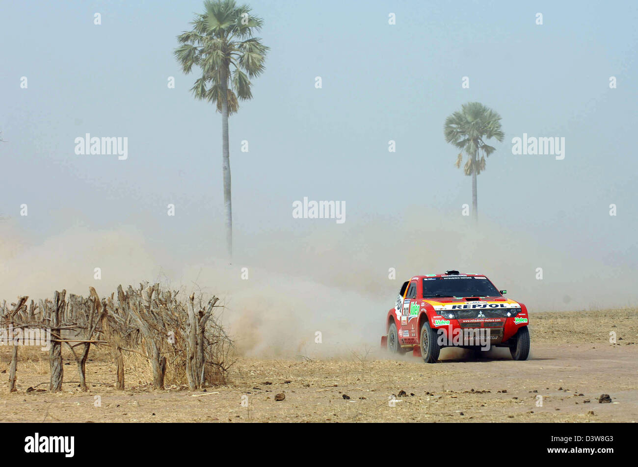 French rallye pilot Stéphane Peterhansel and French copilot Jean-Paul ...