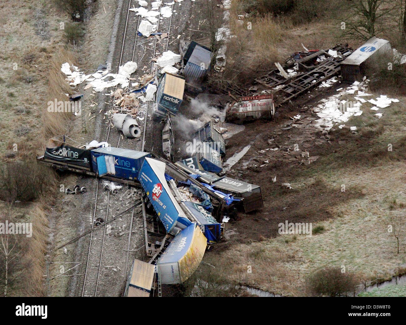 Chloric-gas leaks from derailed carriages of a freight train near Tornesch, rural district of Pinneberg, Germany, Tuesday, 23 January 2007. 11 of the 21 waggons of the freight train derailed and some toppled over due to so far unclear reasons at around 3.30 in the morning. A spokesman of the police said there was no direct danger for the population. Photo: Photo: Kay Nietfeld Stock Photo