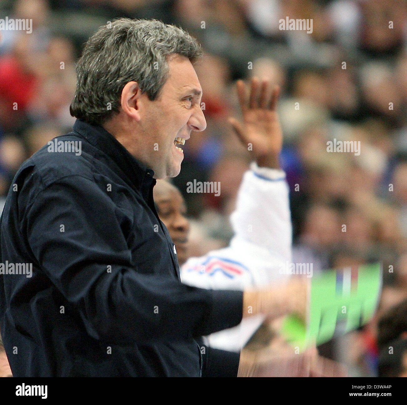 French coach Claude Onesta gesticulates during the 2007 Handball World Championship semifinal match Germany vs France at Koelnarena in Cologne, Germany, Thursday 01 February 2007. Photo: Franz-Peter Tschauner Stock Photo