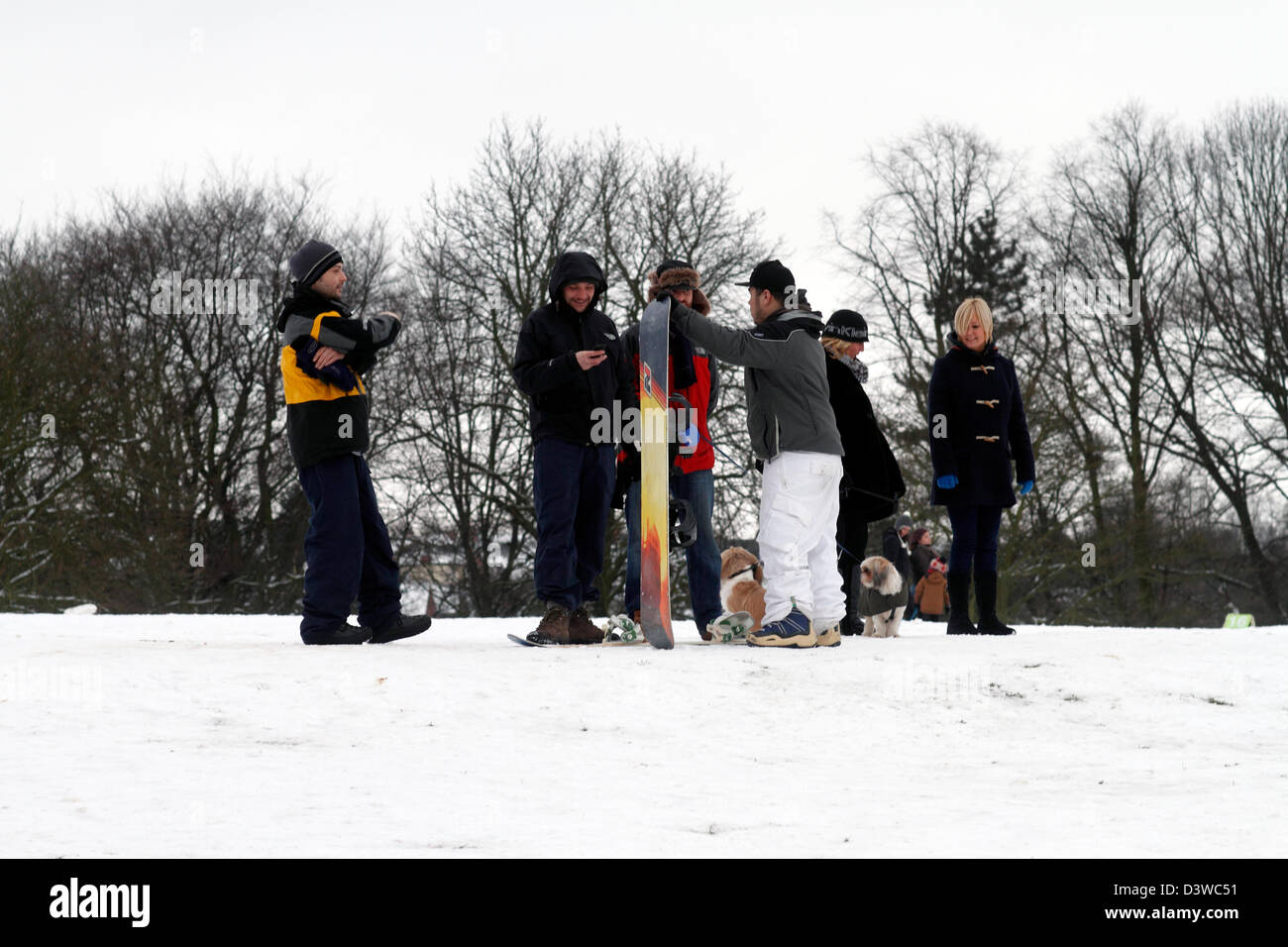 Snowboarding in Woodthorpe Grange park Stock Photo