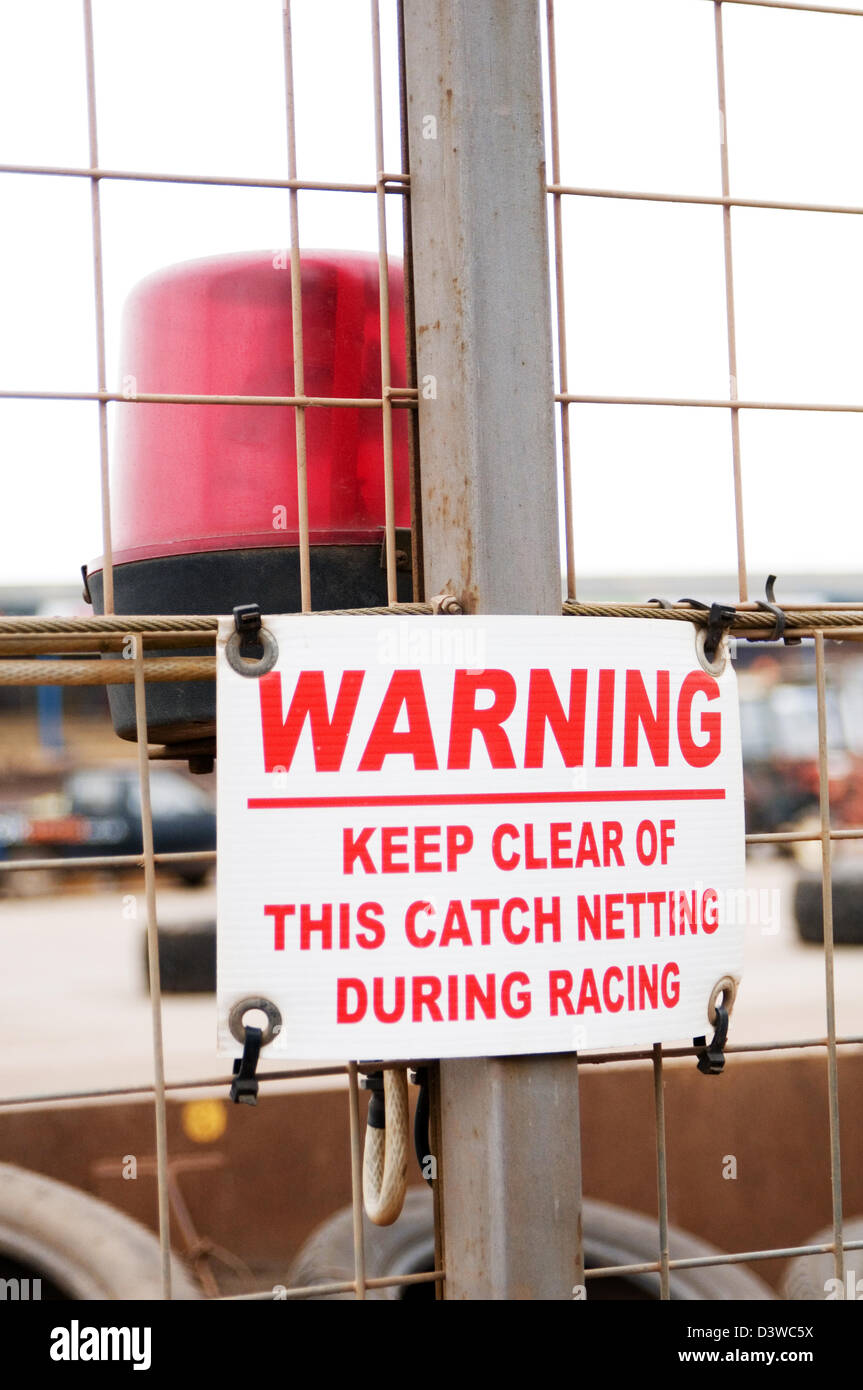 public liability warning a racing track Stock Photo