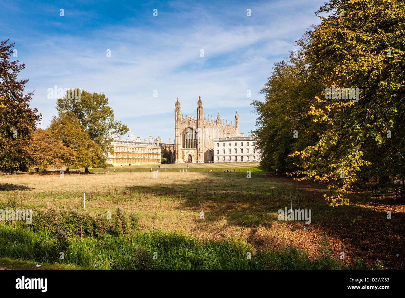 Kings college and chapel viewed across The Backs, punters on the Cam can just be seen, Autumnal light, Cambridge, UK Stock Photo