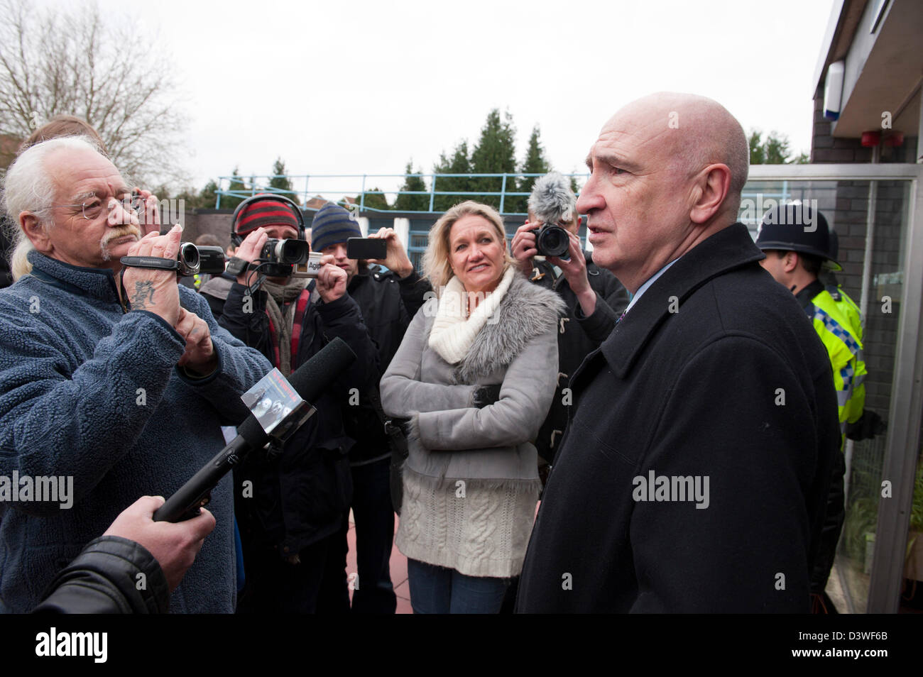 25th February, 2013. Horsham UK.Tony Farrell, former Principal Intelligence Analyst for South Yorkshire Police, talks to the media.9/11 truth documentary maker Tony Rooke is granted a Magistrates Court hearing after making a stand by refusing to pay his TV licence fee and challenging the BBC's support of terrorist activity through supporting the cover up of true evidence of 9/11. The BBC is being challenged strongly for its refusal to present to the British public the available scientific evidence which contradicts the official version of events of 11th September 2001. Photo: Graham M.Lawrence Stock Photo