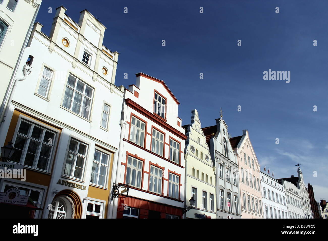 Raw of beautiful old houses on a sunny day, Wismar, Germany Stock Photo