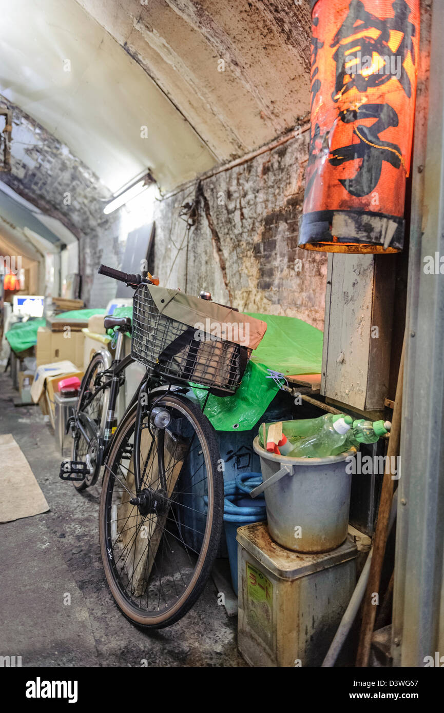 Bicycle parked in a deserted alleyway, Tokyo, Japan, Asia Stock Photo
