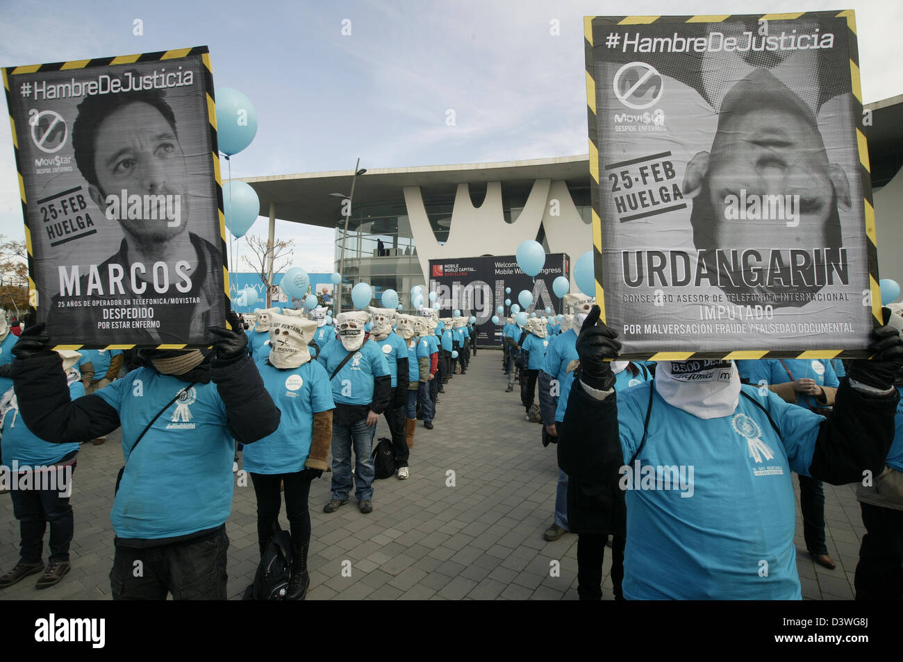 Barcelona, Spain. 25th February 2013. Flashmob by Telefonica Movistar workers against dismissions, during the opening day of the Mobile World congress that takes place in Barcelona, Spain. Credit:  esteban mora / Alamy Live News Stock Photo