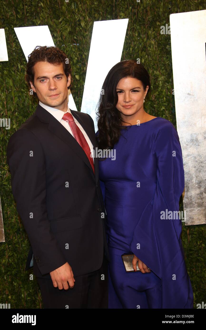 Los Angeles, USA. 22nd February 2013. Actors Henry Cavill and hois  girlfriend Gina Carano arrive at the GREAT British Film Reception at  British Consul General's Residence in Los Angeles, USA, on 22