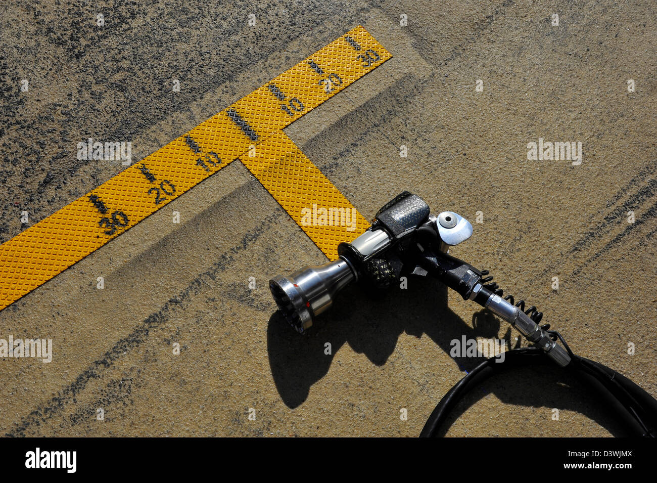 air impact wrench on pit lane during Formula One tests on Circuit de Catalunya racetrack near Barcelona, Spain in February 2013 Stock Photo