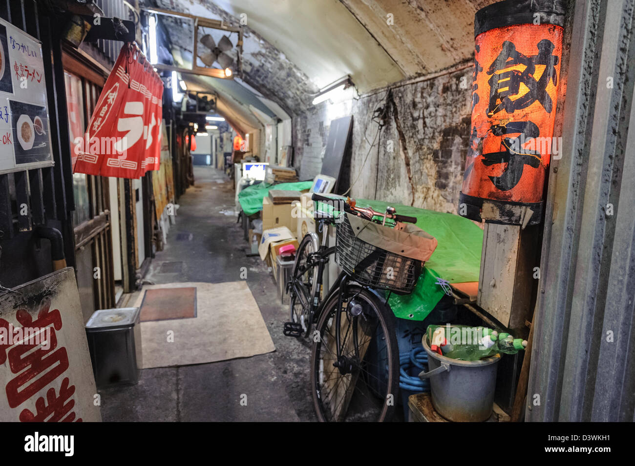 Bicycle parked in a deserted alleyway, Tokyo, Japan, Asia Stock Photo