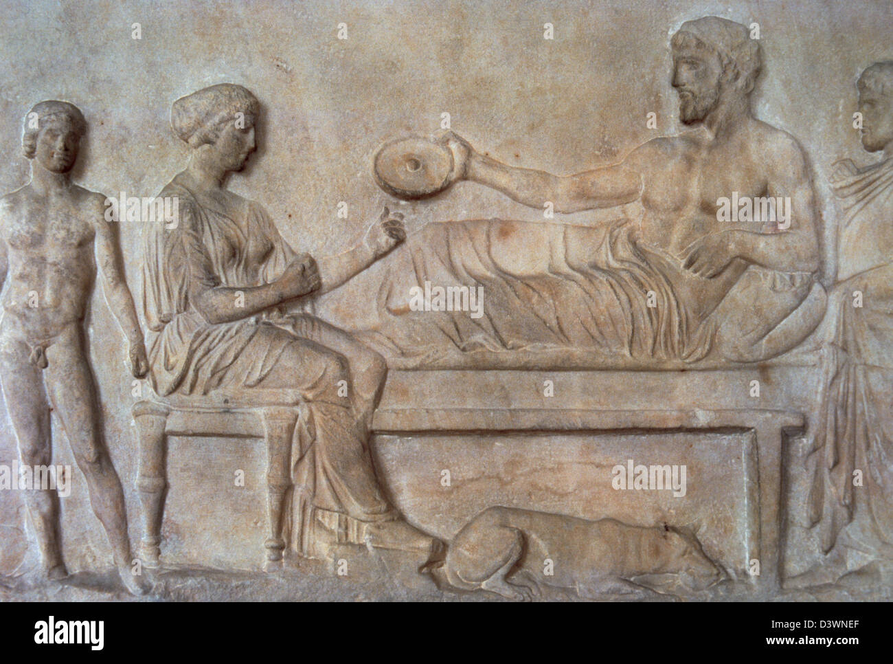 Greek art. Classical period. Grave stele. Relief. Funerary banquet scene. It was found in the Asklepieion (Piraeus). Stock Photo