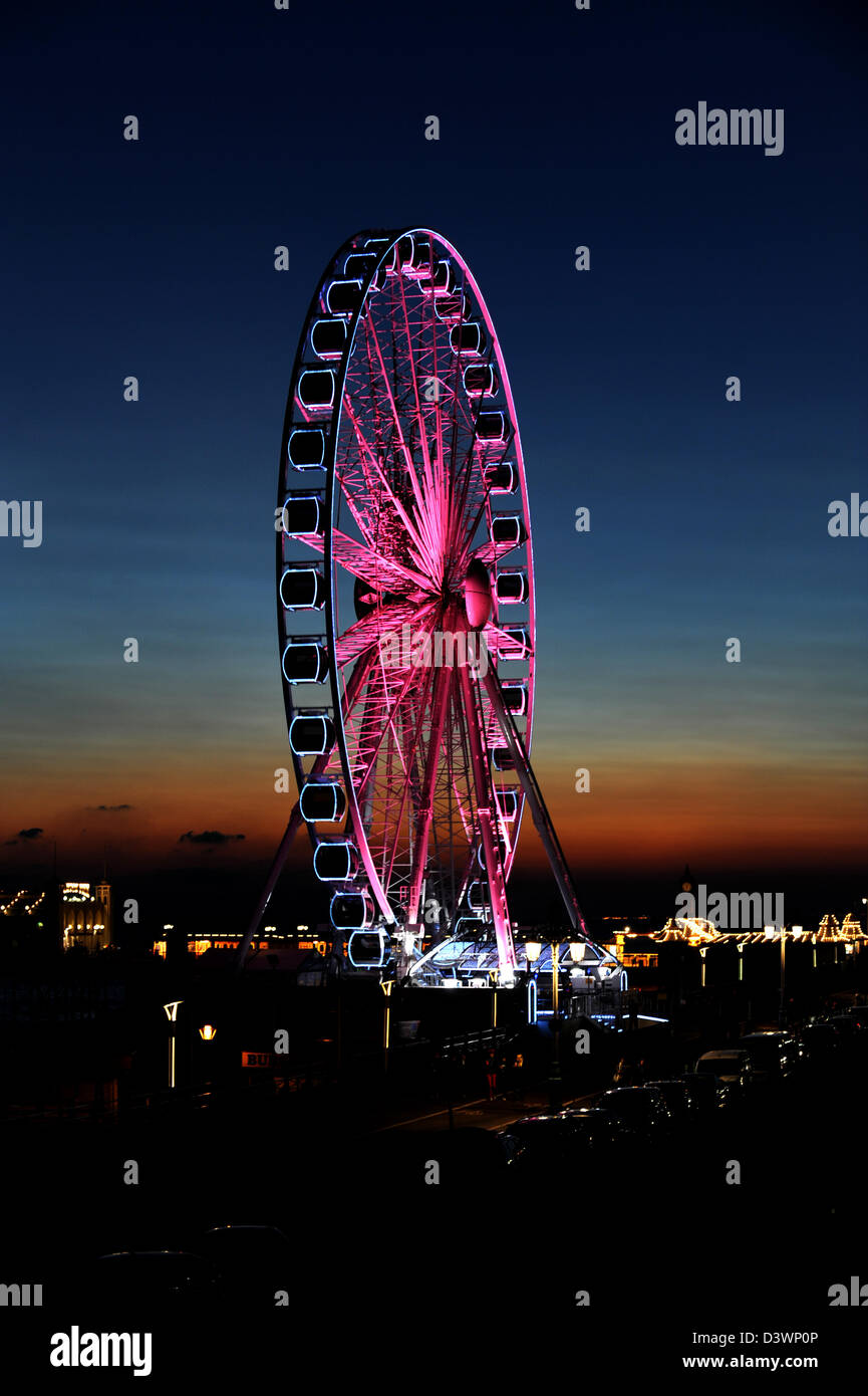 The Brighton Wheel turned pink for Breast Cancer Care and the Pink Ribbon walk Stock Photo