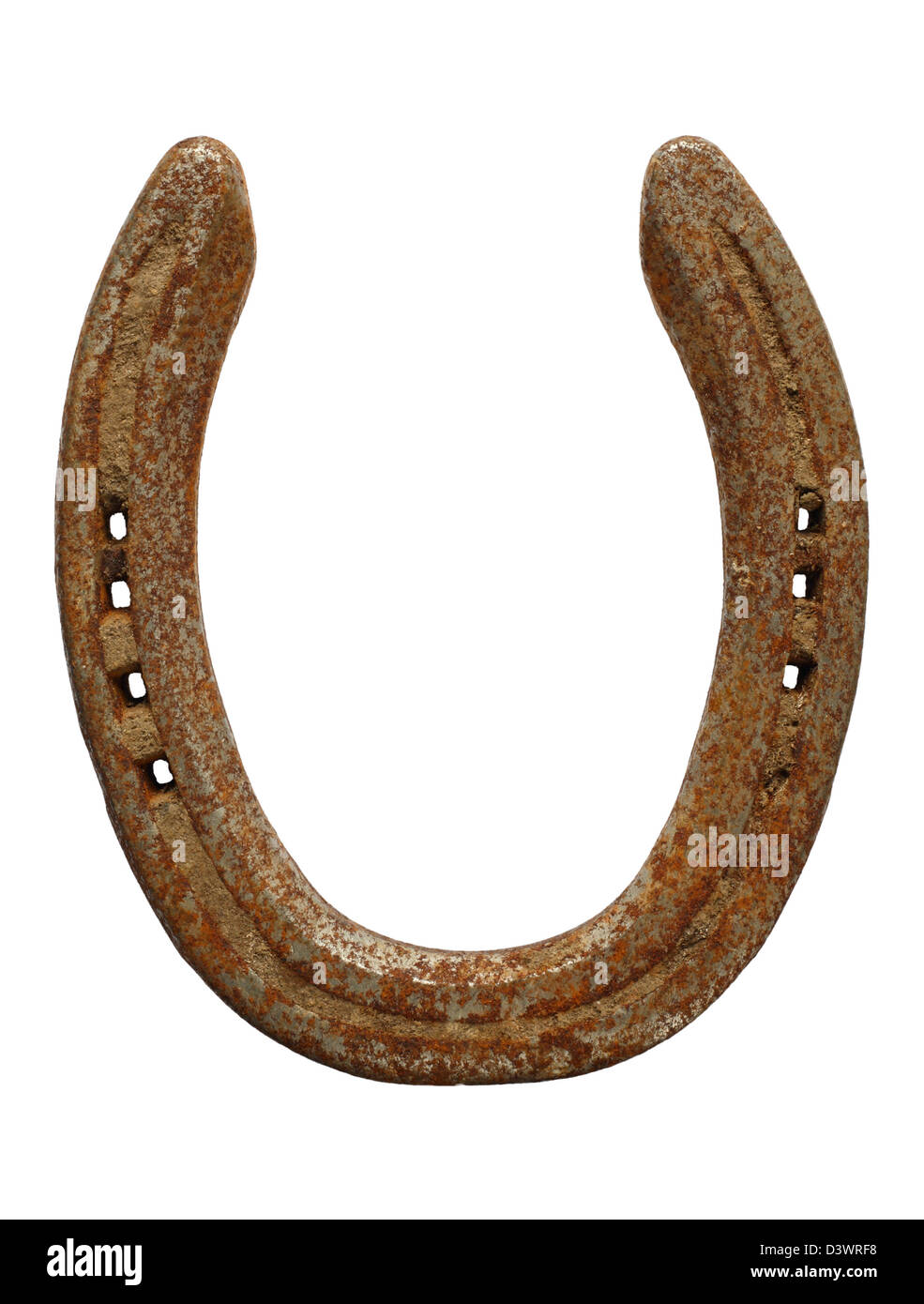 Old rusty lucky horseshoe isolated on a white background. Stock Photo