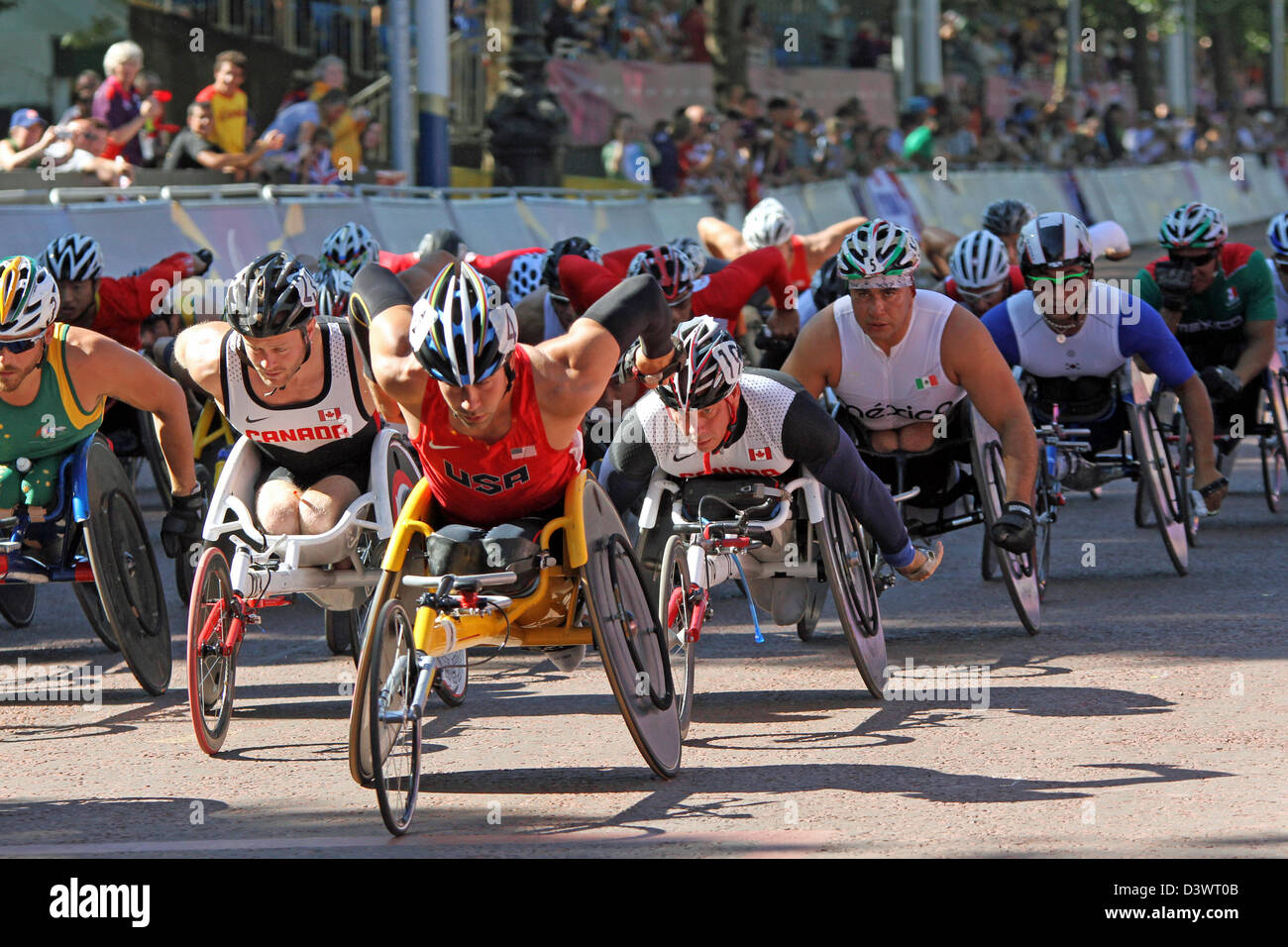 Aaron Pike (USA), Michel Filteau (Canada) Saul Mendoza Hernandez (mexico) in the T54 wheelchair marathon in the mall Stock Photo