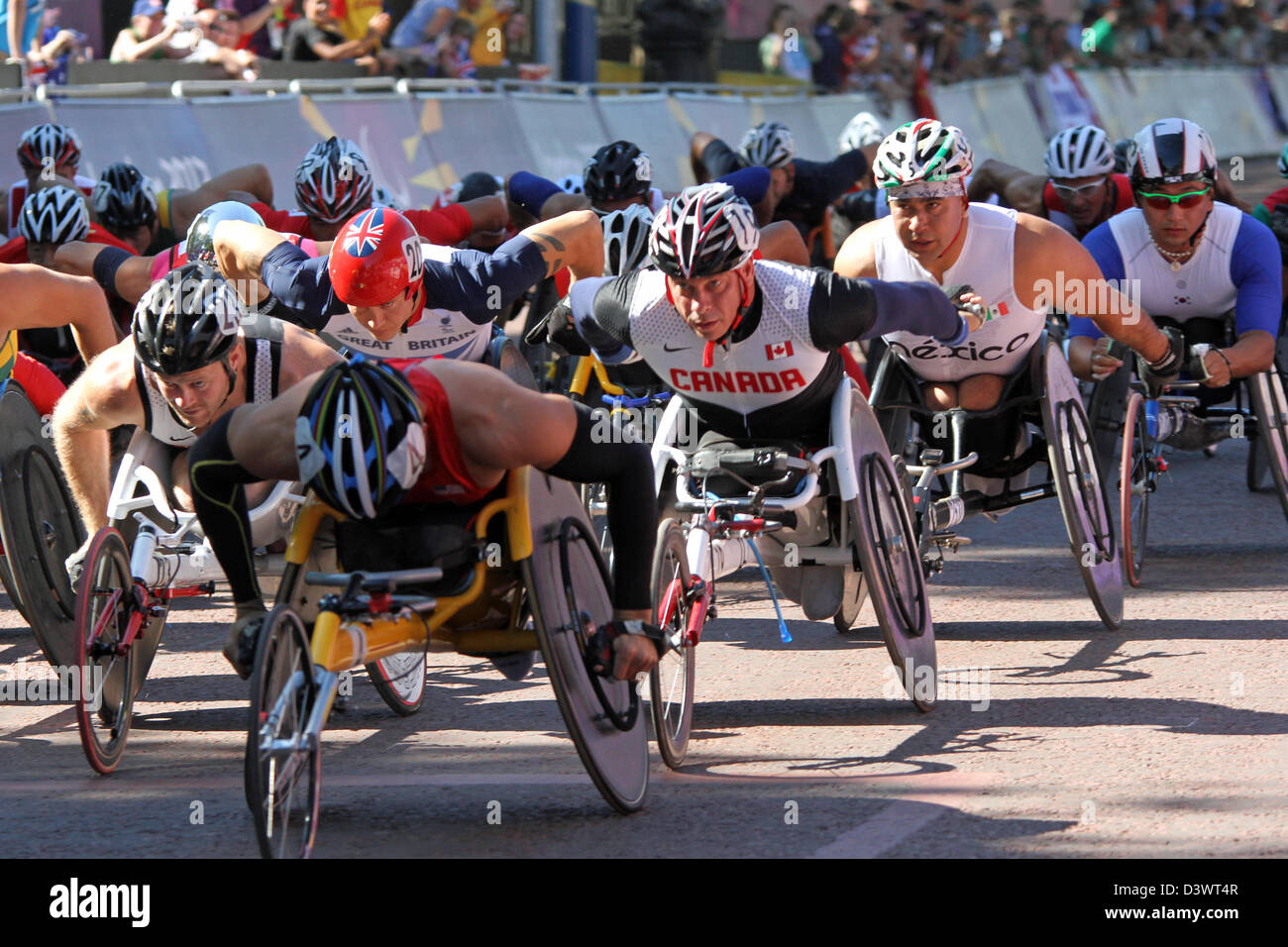 Aaron Pike (USA), Michel Filteau (Canada) Saul Mendoza Hernandez (mexico) in the T54 wheelchair marathon in the mall Stock Photo