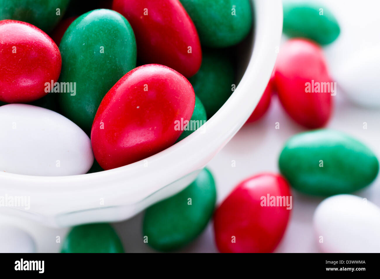 Colorful red, green and white candies on white background Stock Photo Alamy