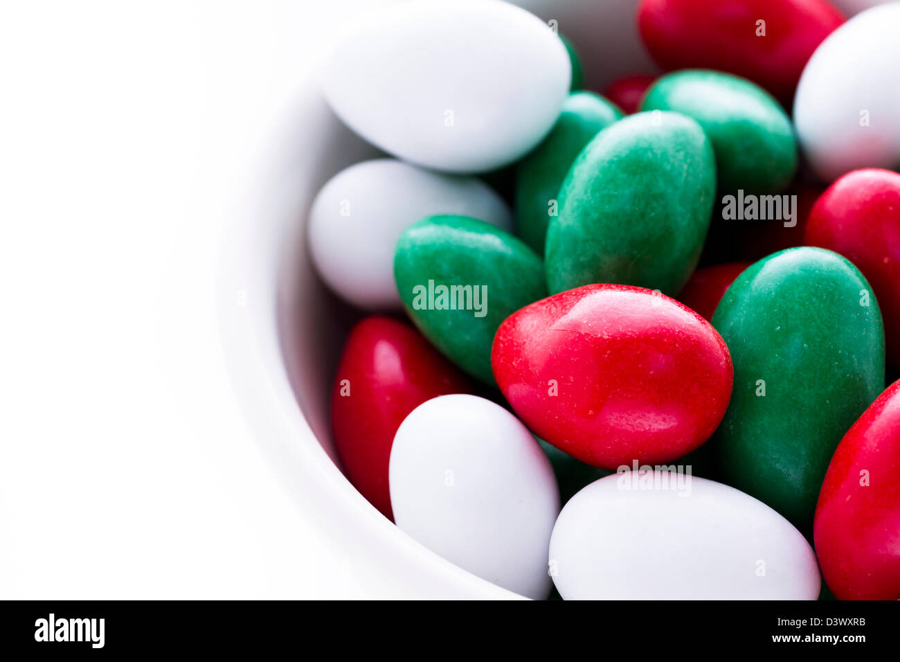 Colorful red, green and white candies on white background Stock Photo Alamy