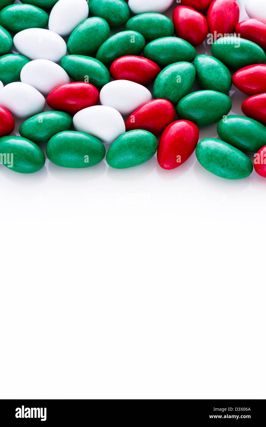 Colorful red, green and white candies on white background Stock Photo Alamy
