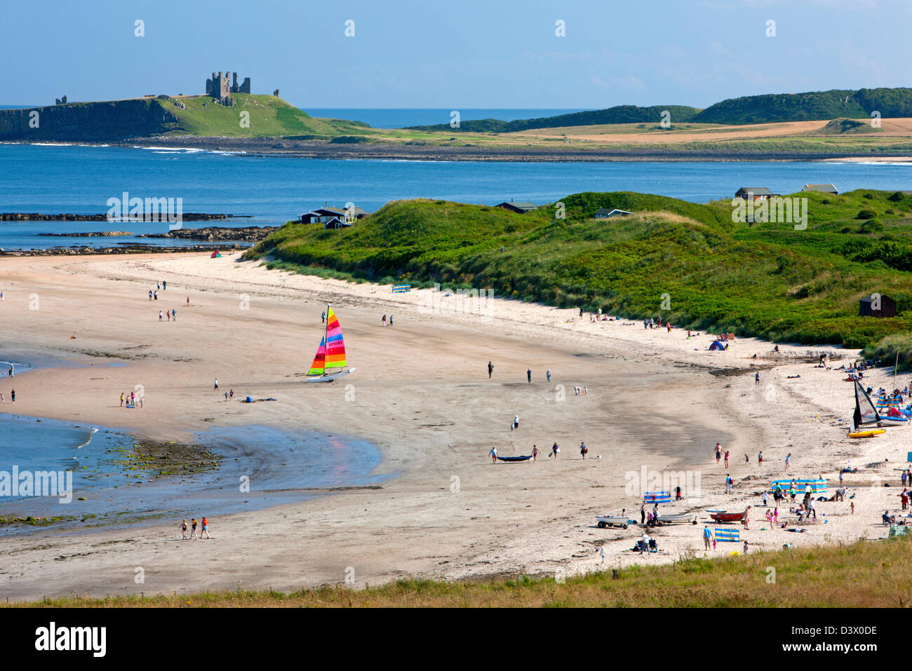 View from Low Newton-by-the-Sea towards Dunstanburgh Castle, Northumberland Stock Photo