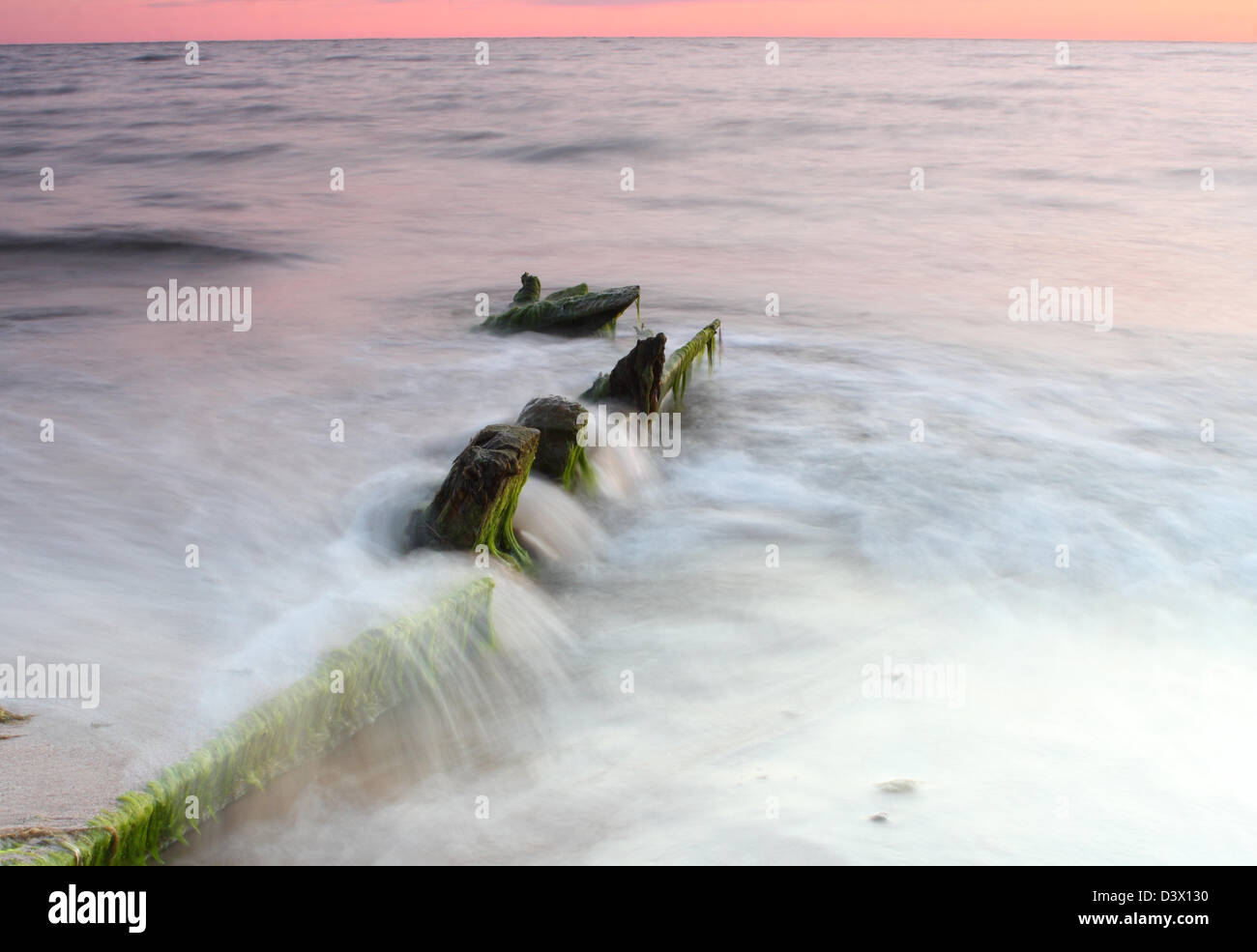 Old ship wreck on the beach Stock Photo