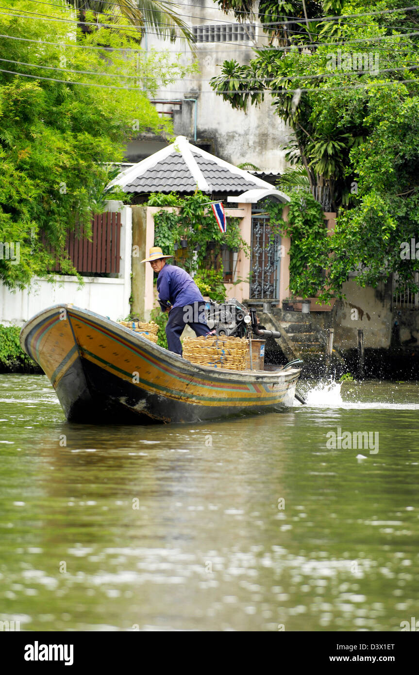 River boat on a tributary of the Chao Phraya River Bangkok, Thailand ...