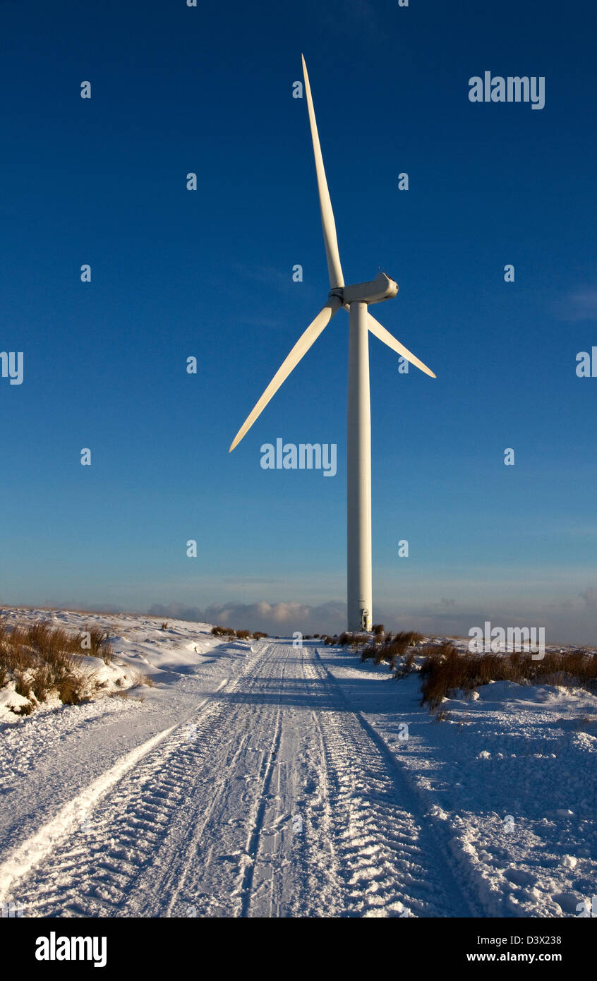 Wind turbines and access track in winter, Scout Moor, (between Bury and Rochdale), Lancashire, England, UK. Stock Photo