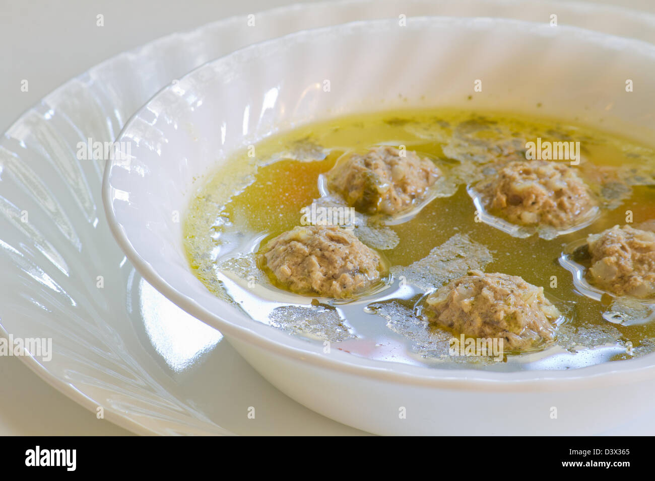 Chicken soup with meat balls and noodles. Stock Photo