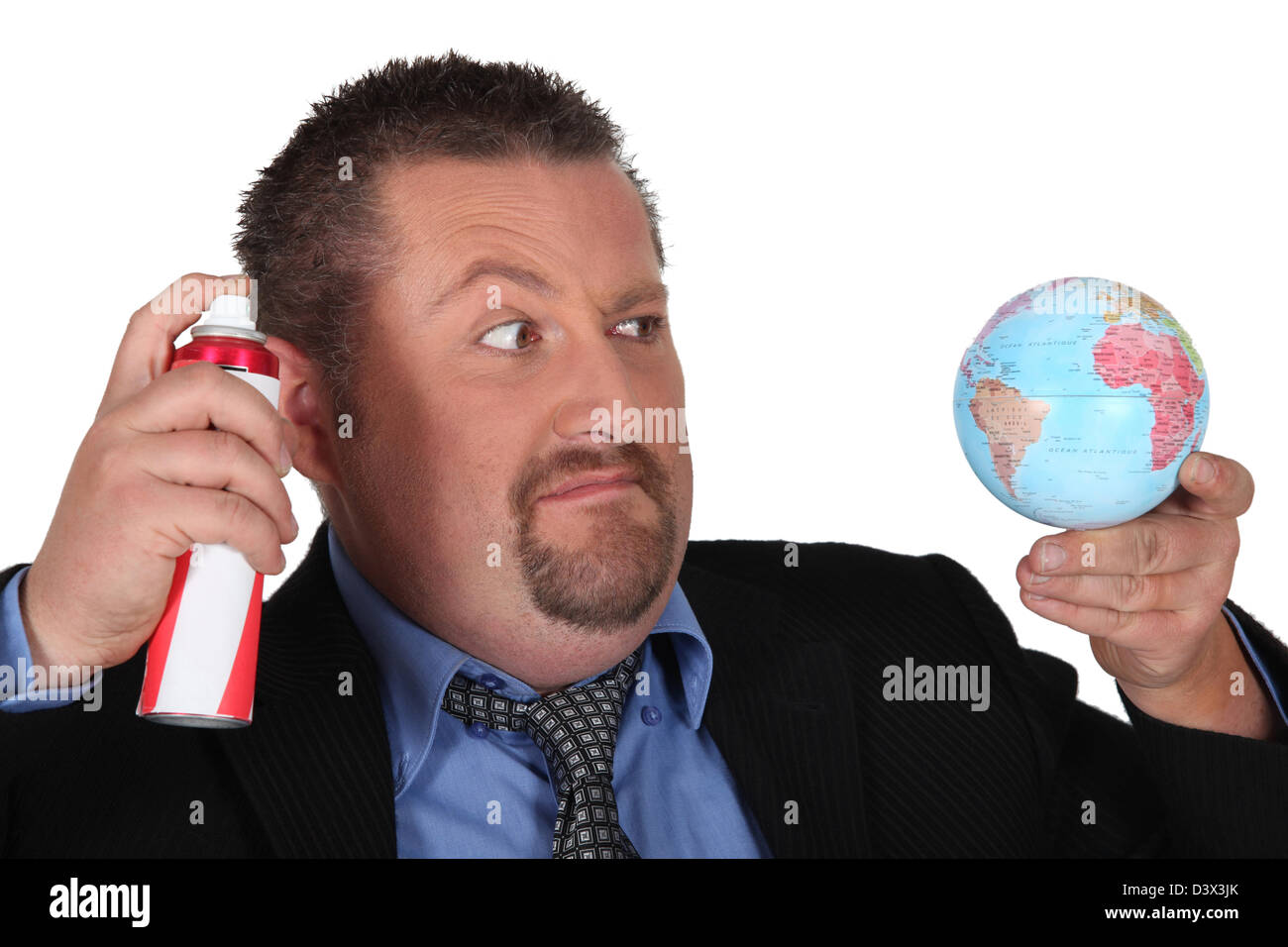 Angry man straying globe Stock Photo