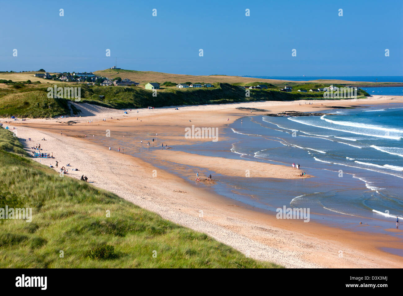 View over Embleton Bay towards Low Newton-by-the-Sea, Northumberland Stock Photo