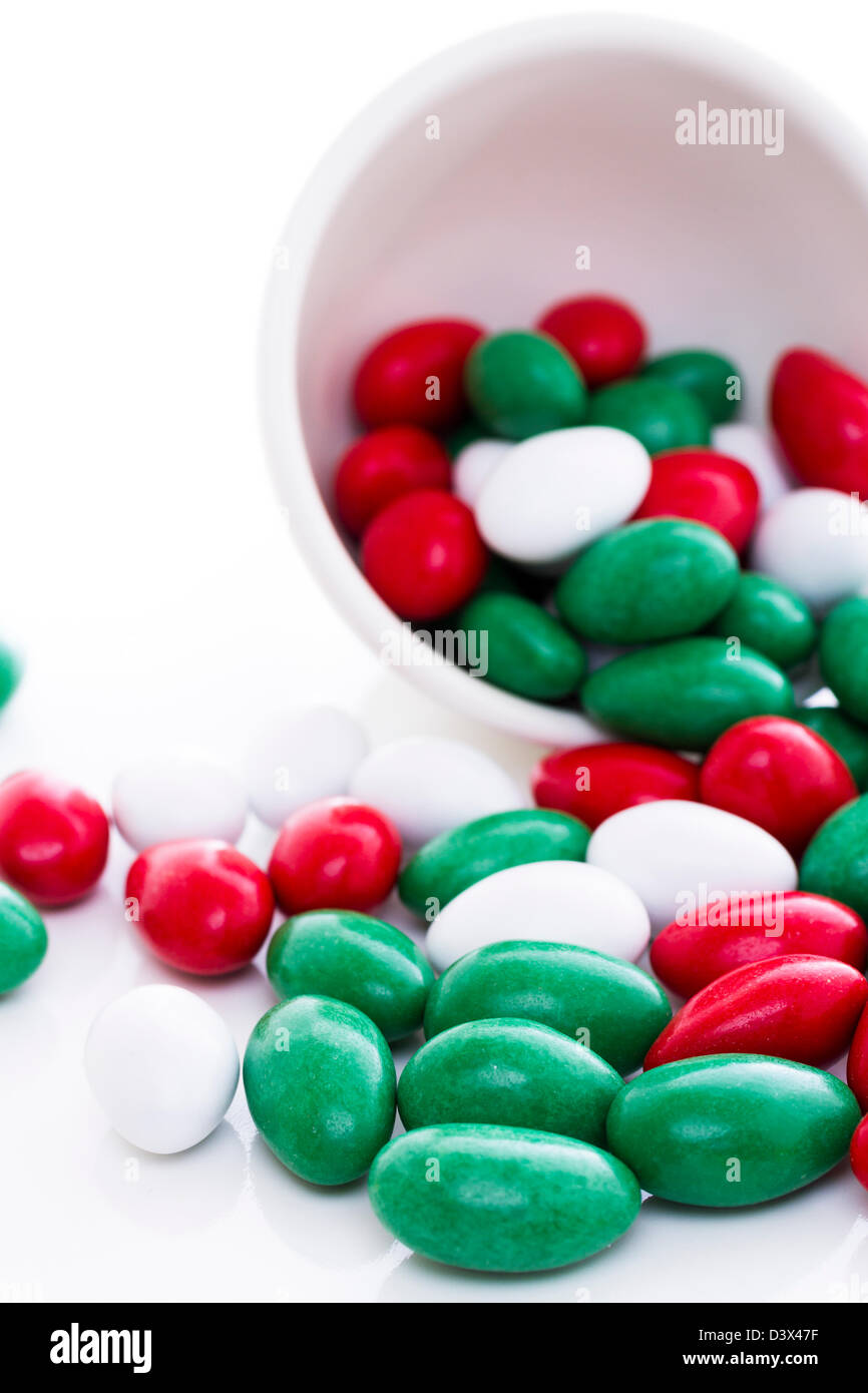 Colorful red, green and white candies on white background Stock Photo Alamy