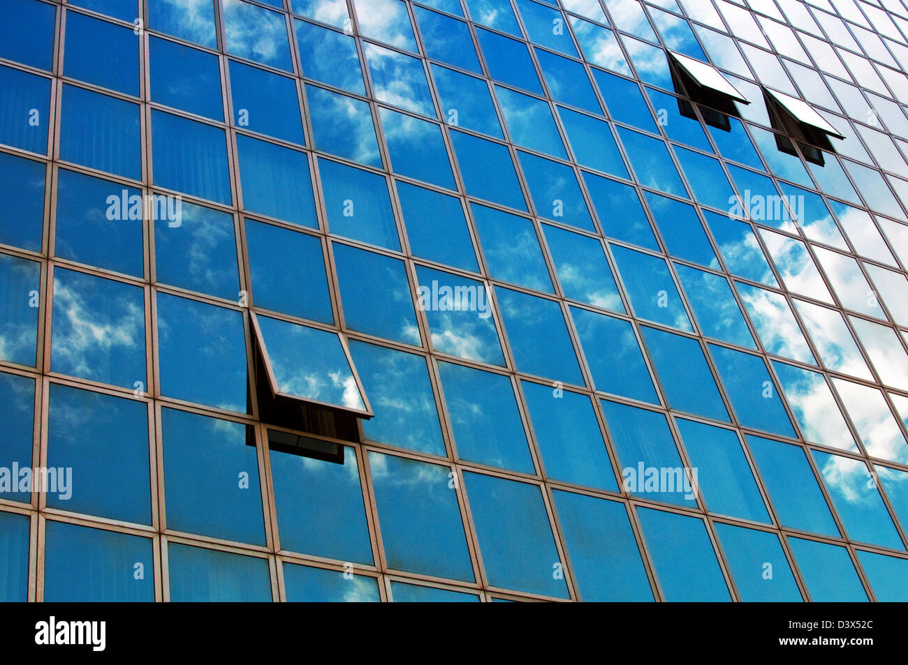 Windows on the office buildings with clouds reflecting Stock Photo - Alamy