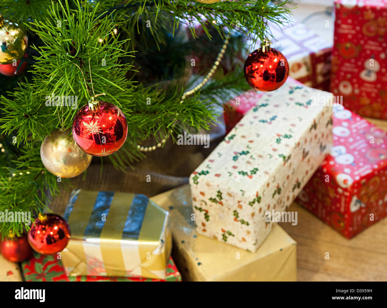 Christmas tree decorations and presents, UK Stock Photo