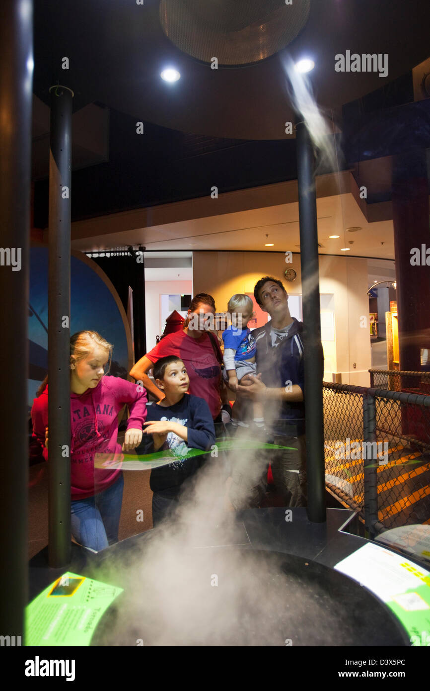 Family viewing Awesome Earth interactive display at Questacon. Canberra, Australian Capital Territory (ACT), Australia Stock Photo