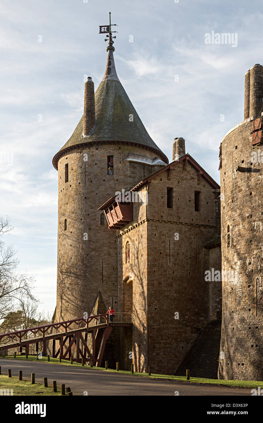 Person on drawbridge for Castell Coch castle, Tongwynlais, Cardiff, Wales, UK Stock Photo