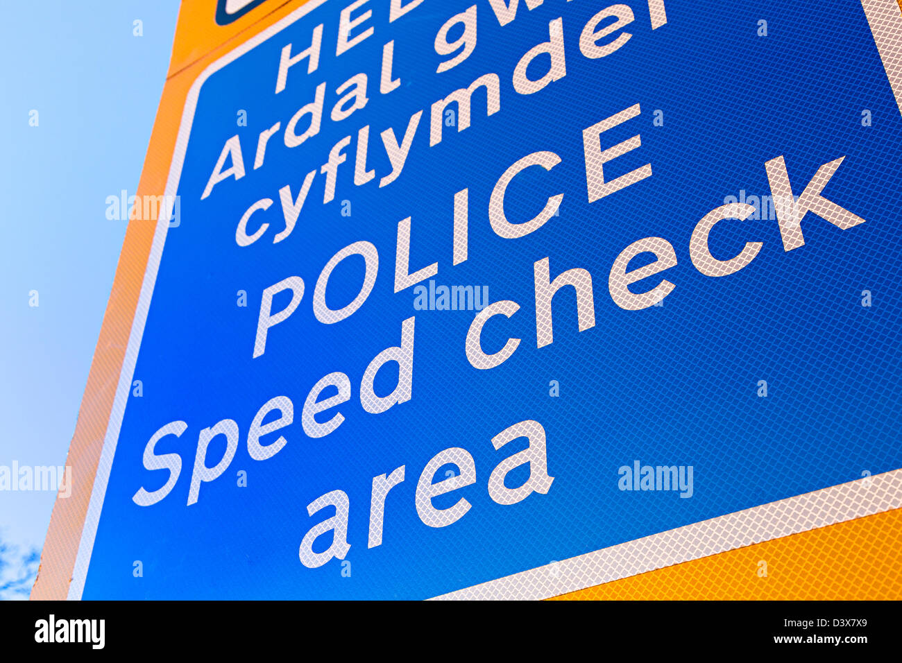 Police speed check area warning sign in English and Welsh, Trefecca, Wales, UK Stock Photo
