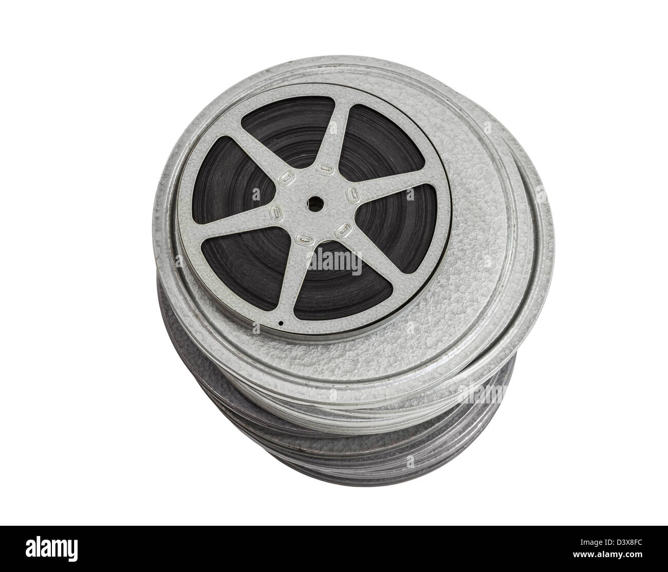 Tall stack of vintage film vans with a reel on top, isolated with