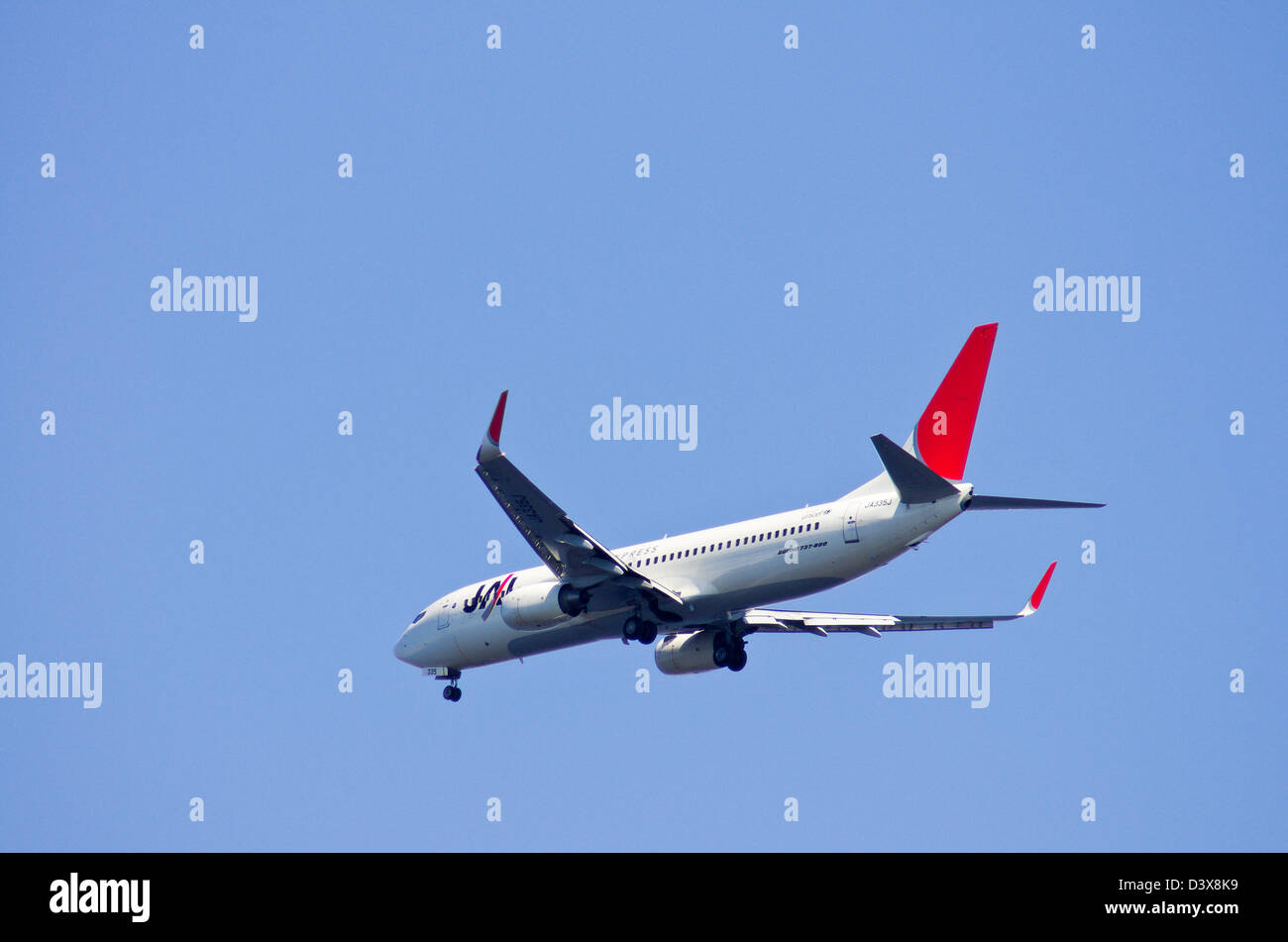 A JAL Express Boeing 737-800 with the old livery departing from Haneda Airport, Tokyo, Japan Stock Photo