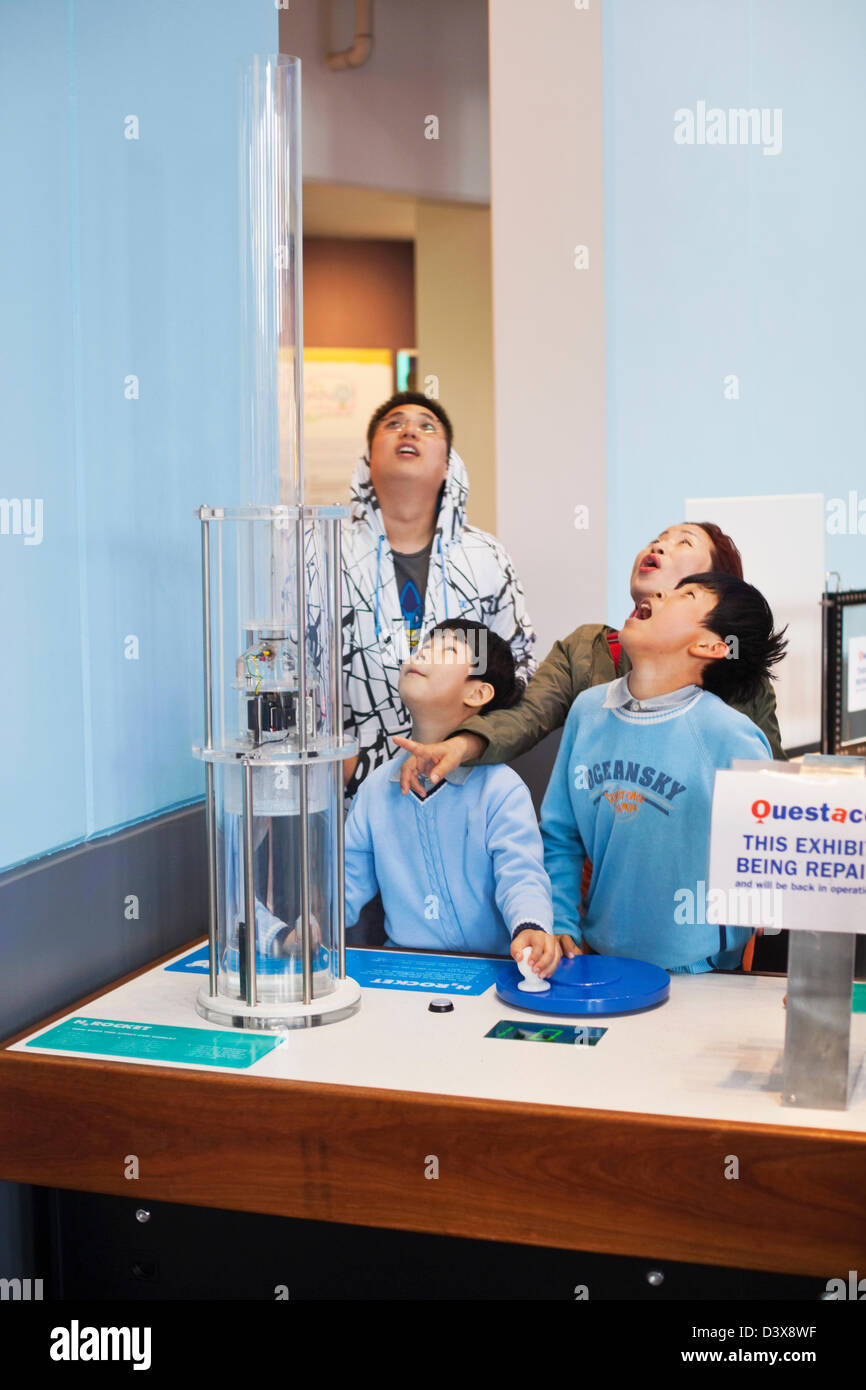 Family enjoying H2O interactive exhibit at Questacon. Canberra, Australian Capital Territory (ACT), Australia Stock Photo