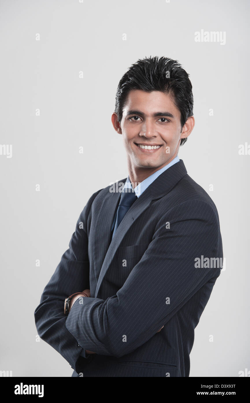 Portrait of a businessman smiling Stock Photo - Alamy