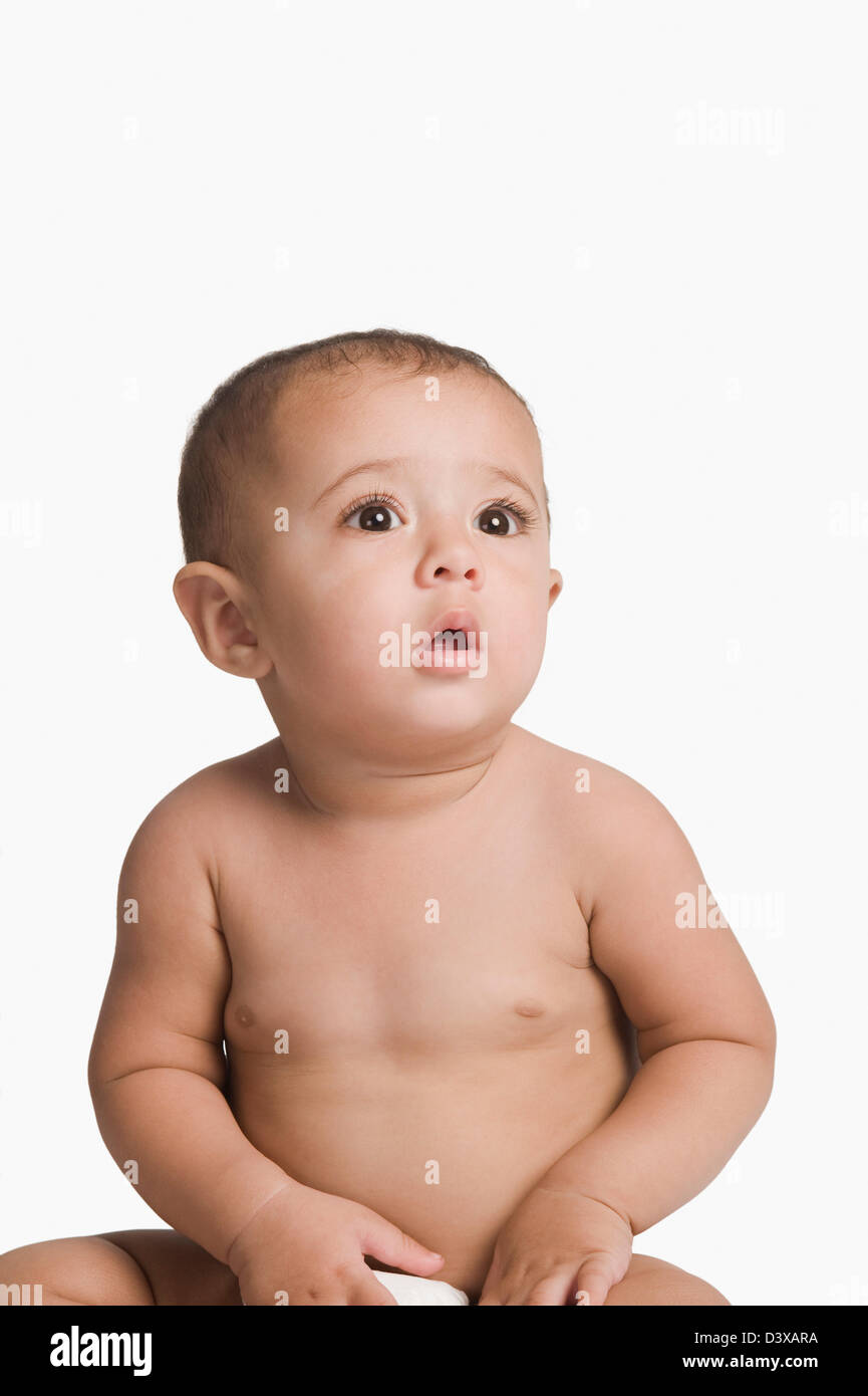 Baby boy thinking Stock Photo - Alamy