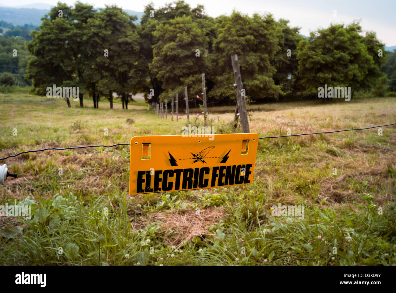Electric fence for cattle cows and horses at a CT farm Stock Photo