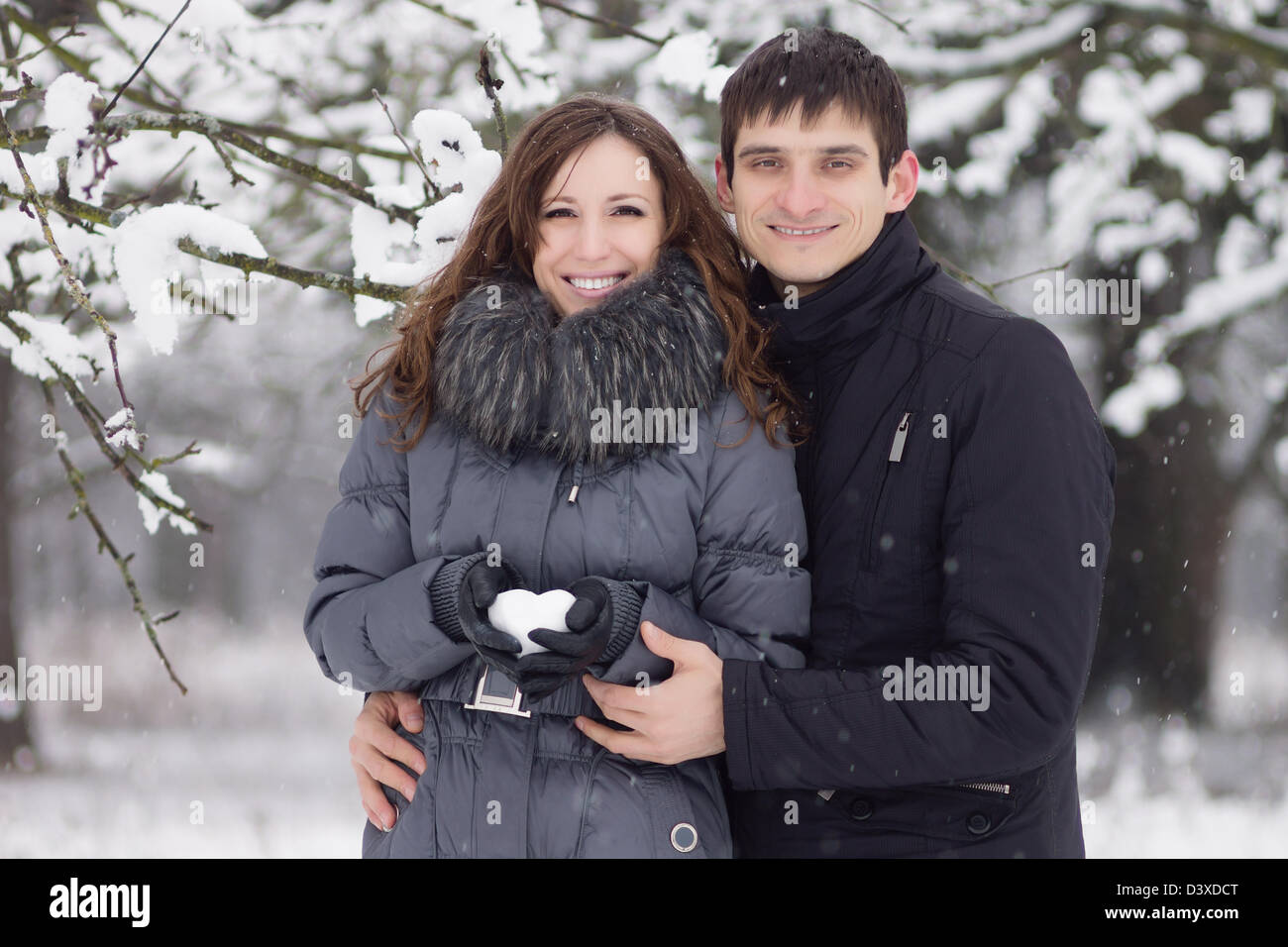 Cheerful young couple in white hi-res stock photography and images - Alamy