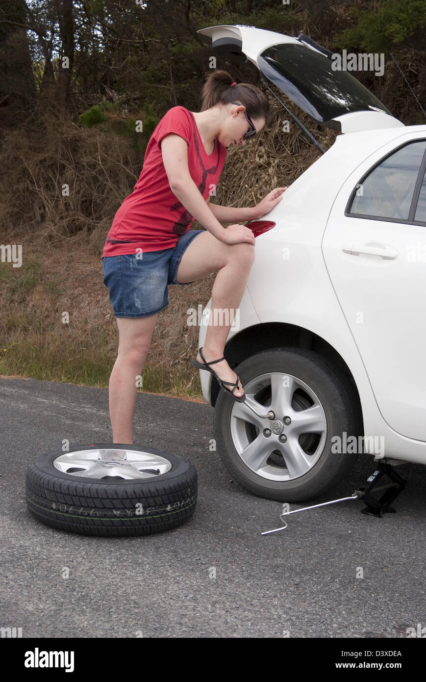 Flat tire woman hires stock photography and images Alamy
