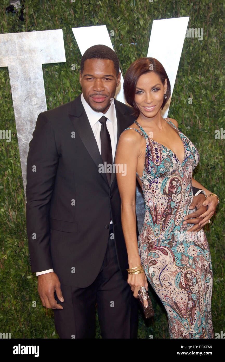 Michael Strahan and Nicole Murphy arrive at the Vanity Fair Oscar Party at Sunset Tower in West Hollywood, Los Angeles, USA, on 24 February 2013. Photo: Hubert Boesl/dpa Stock Photo