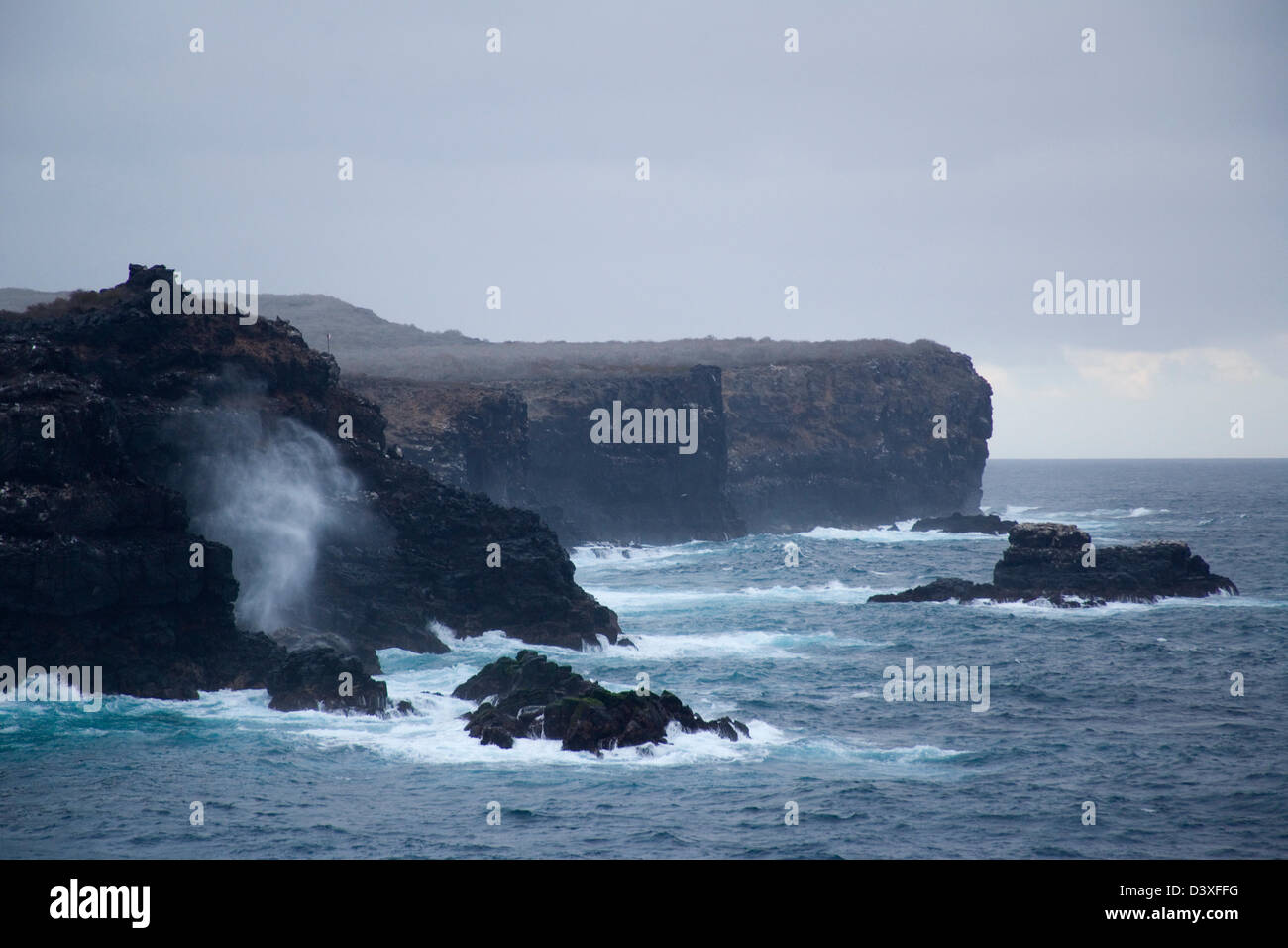 Ecuador, Galápagos Islands, Isla Espanola (Hood), rough seas at the cliffs of Punta Suarez Stock Photo