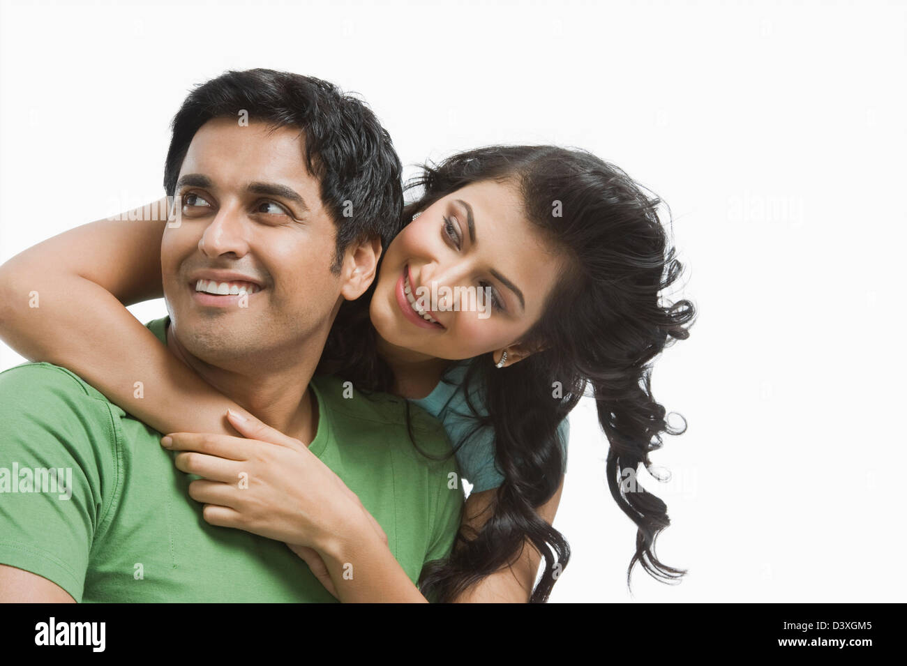 Woman hugging her husband from behind Stock Photo - Alamy