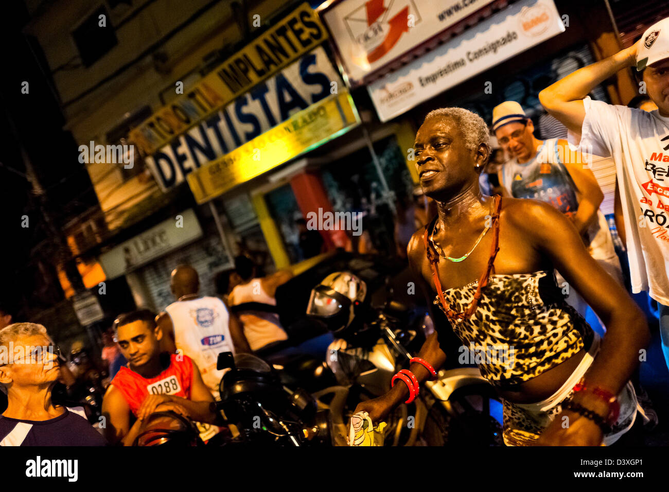 A Brazilian transvestite performs during the Carnival parade in the favela of Rocinha, Rio de Janeiro, Brazil. Stock Photo