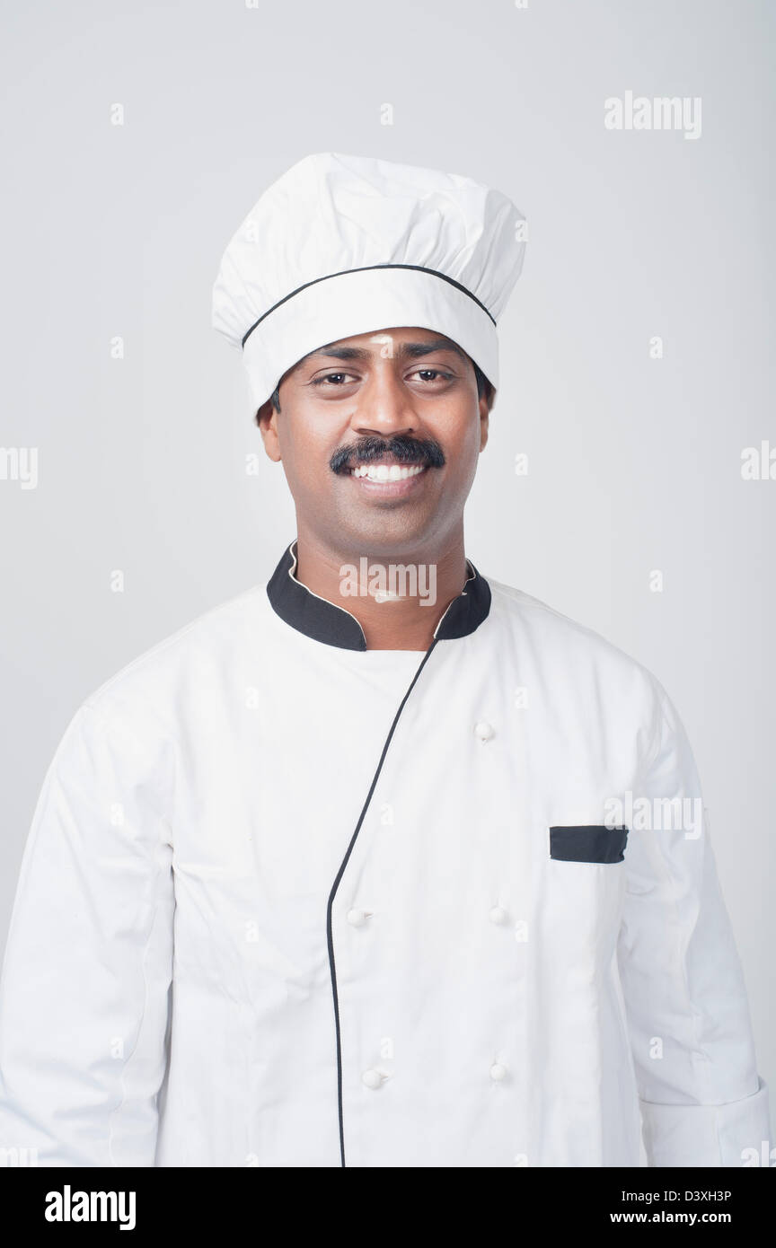 Indian chef standing in the kitchen Stock Photo by ©realinemedia 99236620