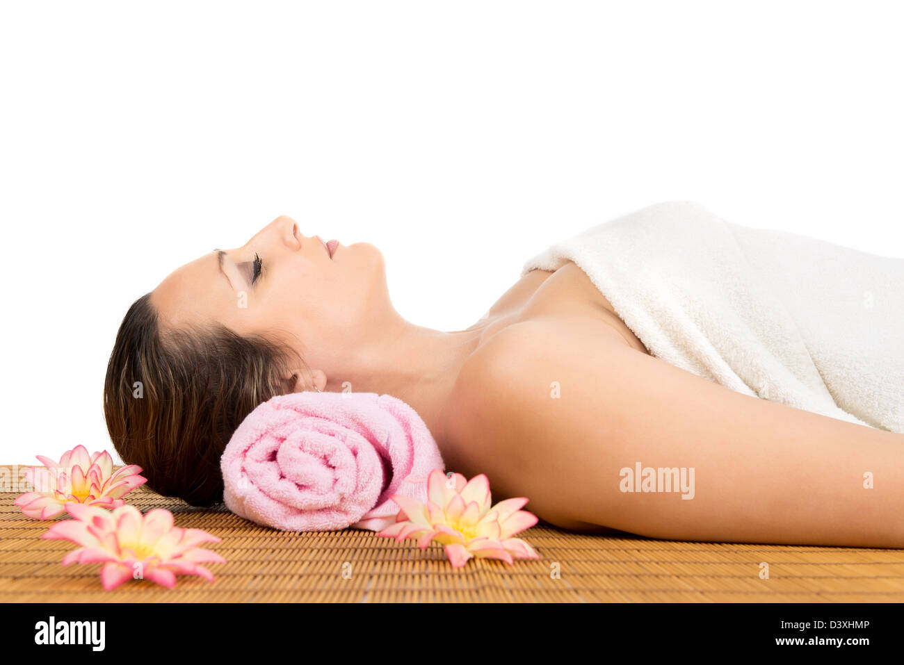 Beautiful woman in a massage at beauty spa salon. Recreation therapy. Stock Photo