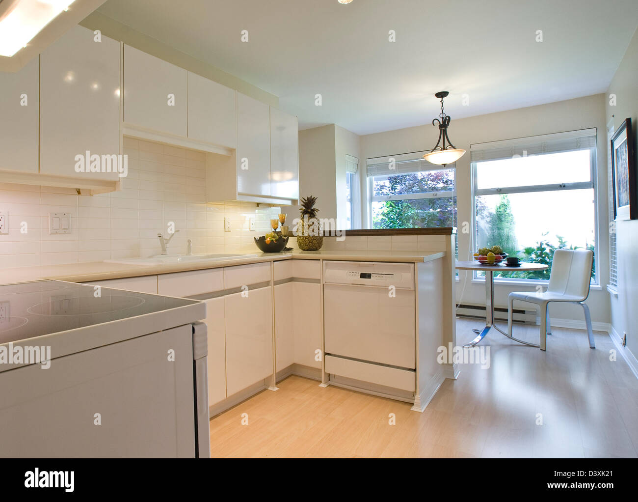 Bright Kitchen with Eating Area Stock Photo
